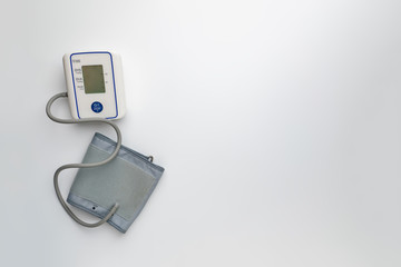 new modern digital tonometer silated, top view with copy space on color backgrounds
