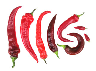 Some red chili peppers on an isolated white background