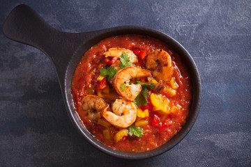 Shrimp Gazpacho with Roasted Red and Yellow Bell Peppers. Spanish pureed cold tomato soup with shrimps
