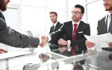 handshake of business people at a working meeting