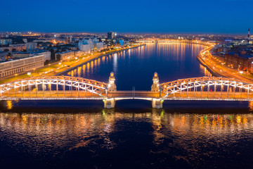 Fototapeta na wymiar St. Petersburg, white nights, Bolsheokhtinsky bridge. Landmark of summer Petersburg. Photo from drone.
