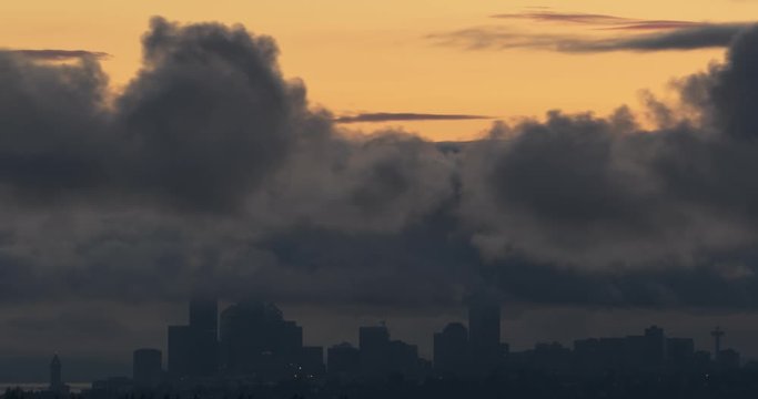 4K Timelapse of Seattle Skyline and Storm Clouds at Sunset
