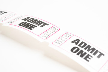 A macro or close-up shot of a strip of generic white sequentially numbered admittance ticket.