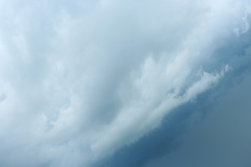Sky with heavy rainy clouds on grey day