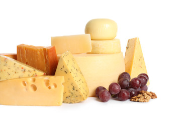 Composition with cheese, grapes and walnuts on white background