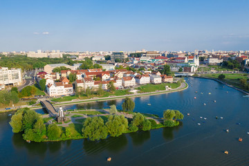Fototapeta na wymiar Aerial View, Cityscape Of Minsk, Belarus. Summer Season, Sunset Time. Panorama Of Nemiga District