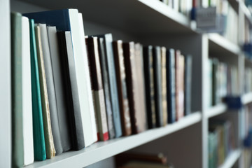 Closeup view of shelves with books in library