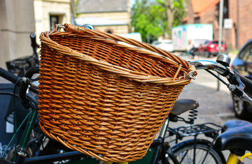 Bicycle with basket on Copenhagen street, Denmark. Colorful old town architecture. Copenhagen style, European street, Denmark bicycle