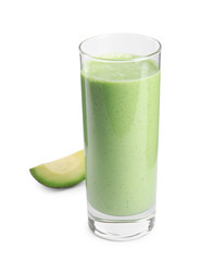 Glass of tasty smoothie and avocado slice on white background