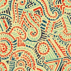 Seamless tribal pattern. Ethnic and aztec motifs. Print for african textiles. Patchwork hand-drawn ornament. Grunge texture. Vector illustration.