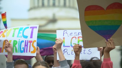Crowd raising posters chanting to respect LGBT rights, support for gay marriage