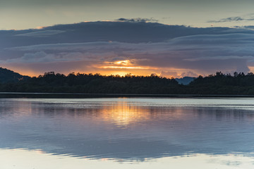 Sunrise Waterscape with Low Cloud Bank
