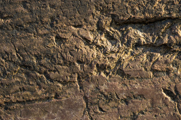Rock plate. Colored stone surface. Wall of the house. Geology and Metamorphic rocks.