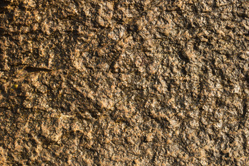 Rock plate. Colored stone surface. Wall of the house. Geology and Metamorphic rocks.