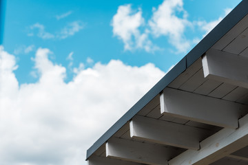 low angle view of new construction against sky with clouds