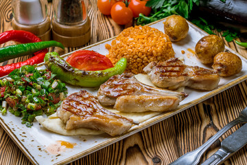 rack of lamb kebab on wooden table Turkish cuisine