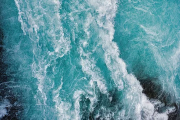 Bruarfoss waterfall in Iceland as an abstract of the blue water and whitewater from above