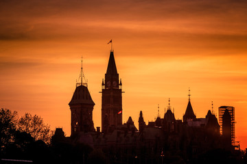Fototapeta na wymiar View of Ottawa city buildings and Rideau canal from Mackenzie King bridge during sunset