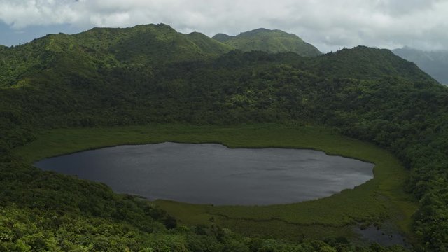 Aerial view of lake in crater of volcano / Grand Etang National Park, Grenada
