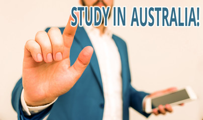 Conceptual hand writing showing Study In Australia. Concept meaning going into foreign country...