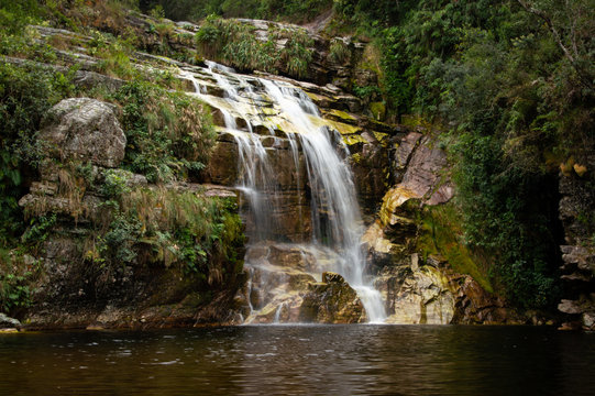 A beautiful waterfall forming lake of murky waters, Ibotipoca State Park