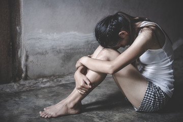 Fototapeta na wymiar Woman with bruises and wound domestic violence rape, concept photo of sexual assault.