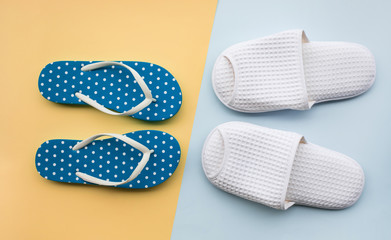 White slippers with color dot sandal on colorful background. relaxation concepts