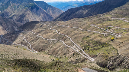 High angle view of zigzag road in Tibet plateau, part of 318 national road in China.