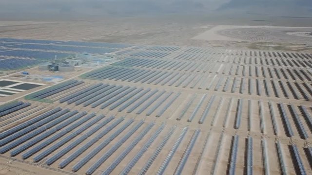 100-megawatt molten salt concentrating solar thermal power plant in Dunhuang, Northwest China's Gansu province (aerial photography)