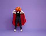 little Dracula with a pumpkin