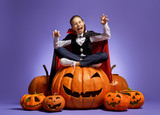 little Dracula with  pumpkins