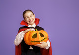 little Dracula with a pumpkin