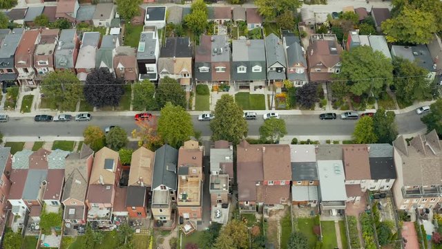 Aerial establishing shot of residential areas in a large metropolitan city. Cinematic 4K footage.