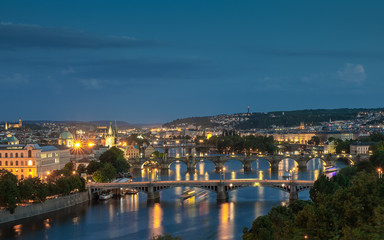 Fototapeta na wymiar Europe, Czech Republic, Prague. Cityscape with Moldva river and all Historical bridges.