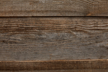 top view of weathered brown textured wooden background