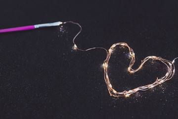 paintbrush painting with light with a set of string led lights