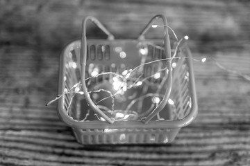 pink shopping basket with fairy lights for brilliant marketing or exciting products