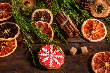 Christmas hot mulled wine with cinnamon cardamom and anise on wooden background