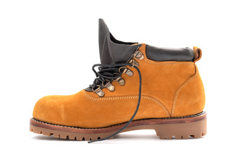 Man fashion yellow boots leather isolated on a white background.