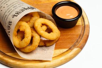 squid rings grilled on a wood