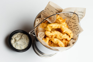 squid rings grilled on a white background