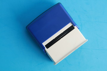 Automatic ink stamp manufactured in blue plastic