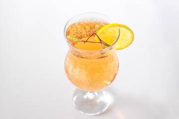 Beetroot microgreens used as garnish for cocktail or mocktail beverage with fizzy bubbles