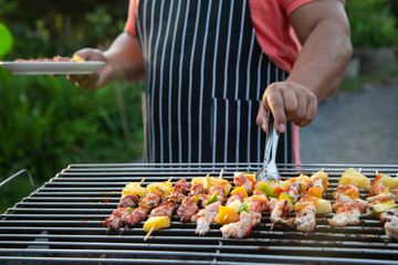 Barbeque Grill Street Food in thailand,Eat outdoors in a happy family. holiday celebration concept