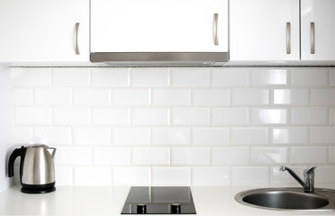 Empty modern kitchen, the concept of simplicity and light in housing