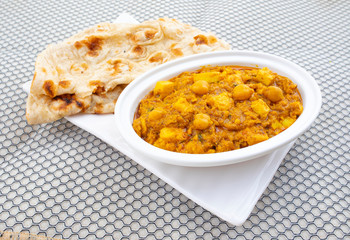 North Indian Healthy Cuisine Chole Paneer or Chole Paneer Curry Served with Tandoori Roti, Made From Boiled Chickpea with Cottage Cheese and Spices