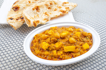 North Indian Healthy Cuisine Chole Paneer or Chole Paneer Curry Served with Tandoori Roti, Made From Boiled Chickpea with Cottage Cheese and Spices