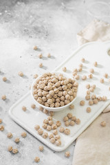 Wheat bran in a white vase. Healthy diet