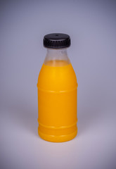 Orange juice in a plastic bottle