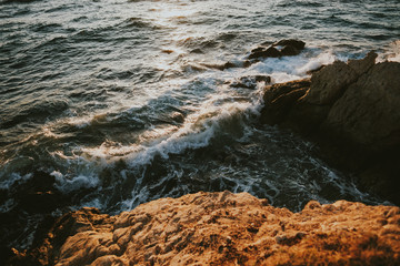 waves breaking on the rocks